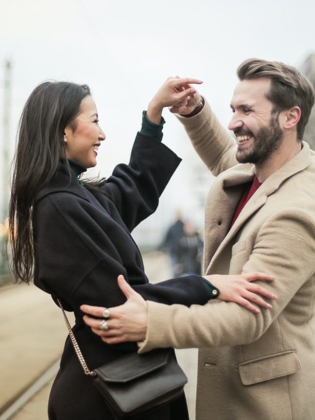 cropped-a-happy-couple-dancing-on-sidewalk-3775545.jpg