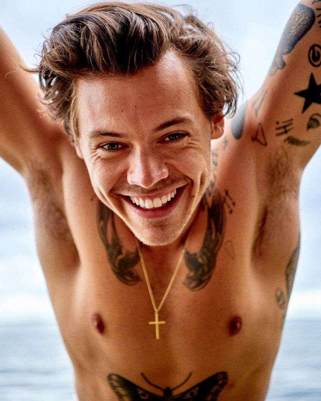 Harry Styles goes topless to reveal his 60 tattoos have been covered up for  new film as he reunites with Olivia Wilde | The US Sun